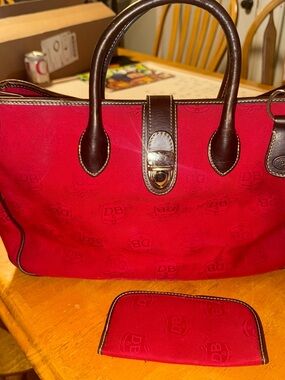 Dooney & Bourke Red Duffel with Brown Leather Trim